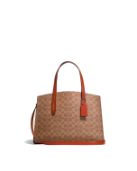 Coach Charlie Carryall in Signature Canvas